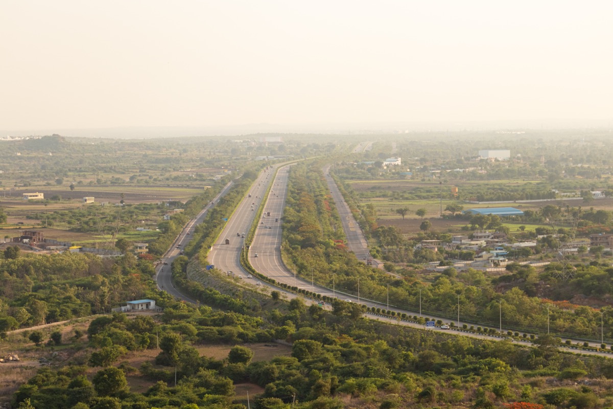 Wide highway near Hyderabad — Vijayawada to Hyderabad one-way drop taxi